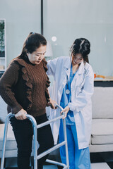 Young doctor examines senior patient's leg