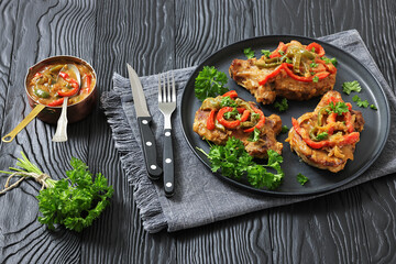 pork chops topped with bell pepper cream gravy