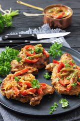 pork chops topped with bell pepper cream gravy