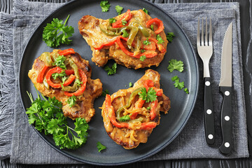 pork chops topped with bell pepper cream gravy