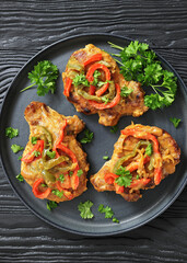 pork chops topped with bell pepper cream gravy