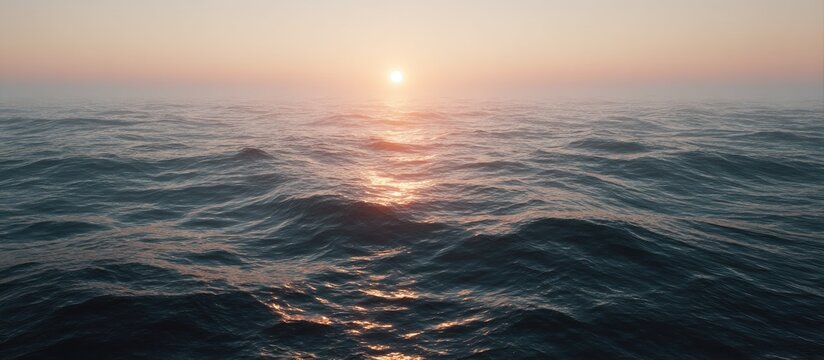 Sunrise over a misty sea - Powered by Adobe