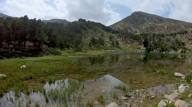 Mountain lake shore in Spain, Catalonia, near the village Puigcerda