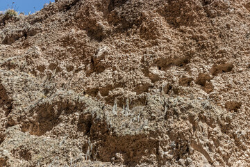 Ancient cliffside tombs near Madrigal village in Colca canyon, Peru