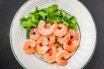 Shrimp salad prawns seafood fresh pescetarian diet gourmet food background on the table rustic food top view copy space keto and paleo diet vegetarian food
