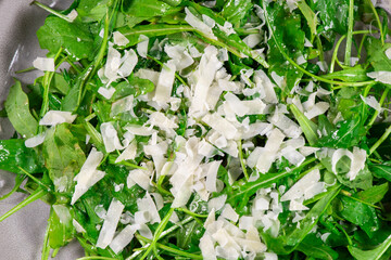 Fresh arugula salad with cheese