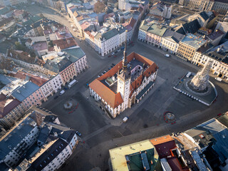 Olomuc, Czech Republic: Aerial view of the famous Olomuc city hall with the Astronomical Clock in the old town upper square in Moravia.