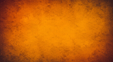 Abstract orange yellow brown background. Toned cement rough plaster texture. Rough wall surface. Autumn, Thanksgiving, Halloween concept background. Copy space