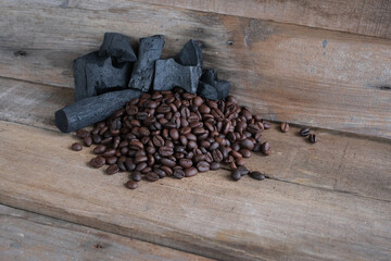 Coffee beans on a wooden background