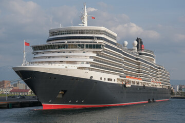 Classic ocean liner cruiseship cruise ship Elizabeth in port of Aomori, Japan with skyscraper...