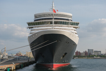 Classic ocean liner cruiseship cruise ship Elizabeth in port of Aomori, Japan with skyscraper...