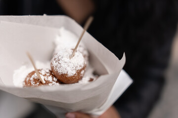 Traditional Belgian Smoutebollen Served in Paper Cone