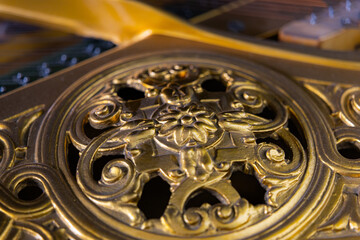Ornate Brass Detail on a Grand Piano