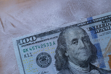 Frozen One Hundred US Dollar Bill Under