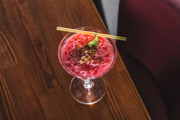 Strawberry-Flavored Pink Dessert in Decorative Glass Dish - Sweet Pink Strawberry Mousse Served...