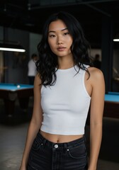 Fototapeta premium Stylish Woman in White Tank Top and Jeans, Confident Pose