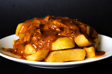 Plate Of British Favourite Chicken Curry And Chips