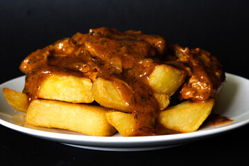 Plate Of British Favourite Chicken Curry And Chips
