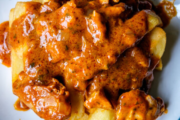 Plate Of British Favourite Chicken Curry And Chips