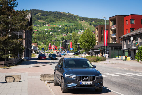 MAY 21, 2025. OPPDAL, NORWAY: A modern Volvo XC60 SUV parked on a central street in the town of Oppdal on a sunny spring day.