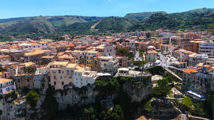 Fototapeta premium Aerial view of Tropea town on a cliff overlooking the Tyrrhenian Sea in Calabria, Southern Italy