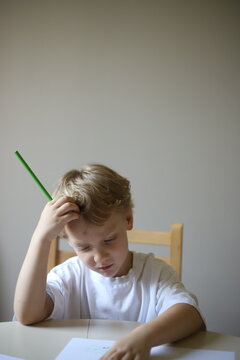little boy studying