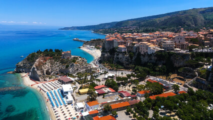 Aerial view of Tropea, a charming town perched on a cliff overlooking the turquoise waters of the Tyrrhenian Sea, Calabria, Southern Italy