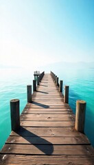 Naklejka premium Rustic wooden pier stretches out over calm, blue water towards a hazy horizon, bathed in soft sunlight Perfect for travel, vacation, or coastal themed projects , texture, clouds