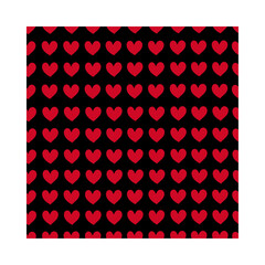 Red heart pattern on black background. Seamless pattern for graphic design, fabric, or paper.