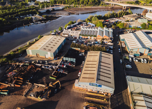 Blaydon UK: 05-05-2025. Aerial view of Blaydon Industrial Estate and Scrap metal recycling yard on the banks of the River Tyne. Drone shot during golden hour
