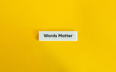 Words Matter Letter Tile on Yellow Background – Minimalist Communication and Language Concept