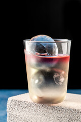 Elegant luxury cocktail in front of dark background