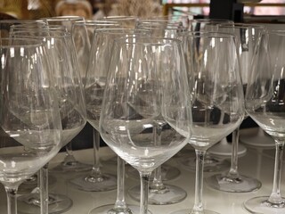 Elegant collection of crystal clear wine glasses displayed for sale in a stylish store