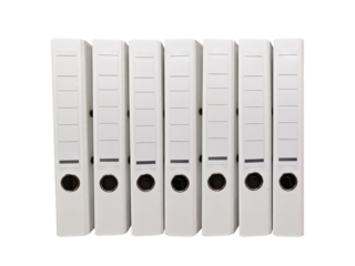 Organized white binders lined up on a shelf for office or study storage