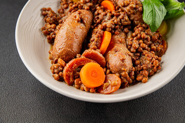 Sausage with lentils and vegetables appetizer vegetable dish fresh tasty gourmet food background on the table rustic food top view copy space