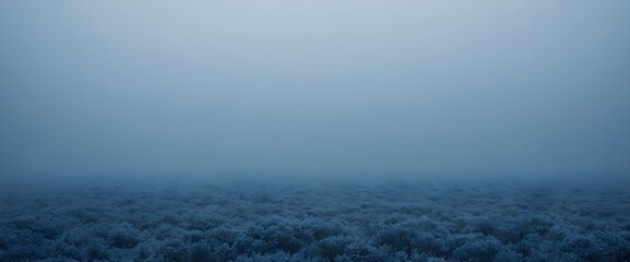 Fototapeta premium Mist over a blue landscape