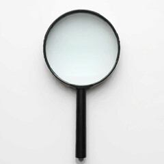Magnifying Glass Lies Isolated, Ready for Detailed Investigation

