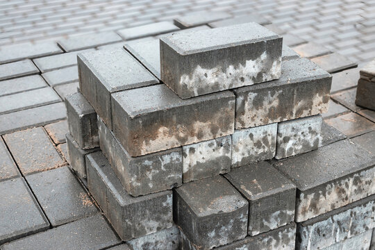 Construction project featuring stacked bricks in a building site during daylight hours
