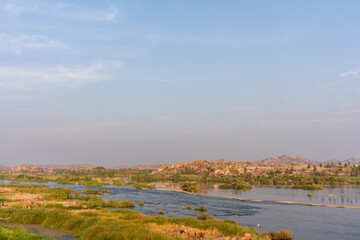 Scenic View of River and Rocky Landscape from Bukkasaagara Aanegundi Bridge in Hampi, India