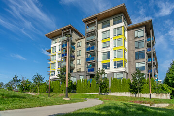 Modern apartment building with nice summer landscape in Vancouver, Canada, North America. Day time...