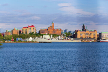 Gothenburg city skyline with HswMS Halland class destroyer Smaland and Navigation school on sunny day, Sweden