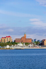 Gothenburg city skyline with HswMS Halland class destroyer Smaland and Navigation school on sunny day, Sweden