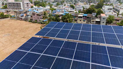 Solar panel close up with city background.