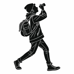 Fototapeta premium Young person with backpack taking photo silhouette