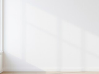 A clean, empty white wall in a bright interior space. Natural light casts soft shadows on the surface, creating a serene atmosphere.