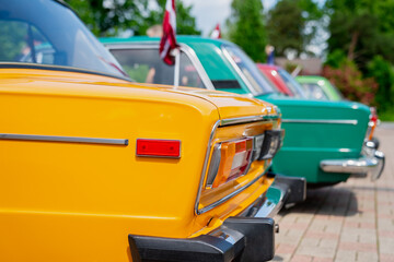 Bright renovated old school vintage cars, Soviet-era automobiles were primarily known for their...