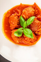 Meatballs tomato sauce beef, pork or chicken meat fresh delicious gourmet food background on the table rustic food top view copy space keto and paleo diet