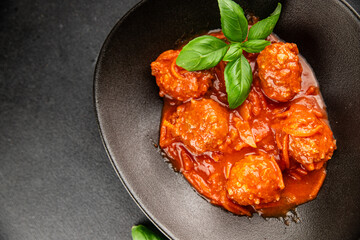 Meatballs tomato sauce beef, pork or chicken meat fresh delicious gourmet food background on the table rustic food top view copy space keto and paleo diet