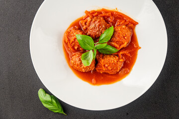 Meatballs tomato sauce beef, pork or chicken meat fresh delicious gourmet food background on the...