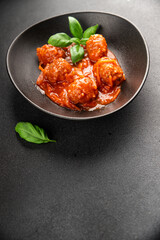 Meatballs tomato sauce beef, pork or chicken meat fresh delicious gourmet food background on the...